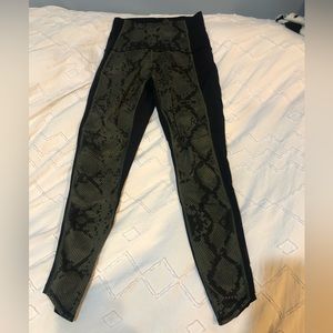 Lululemon laser cut green geometric patterned leggings